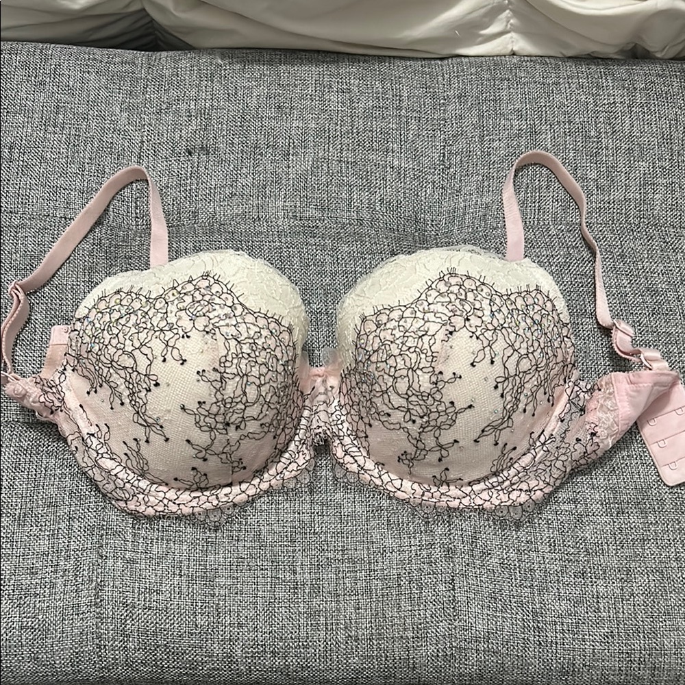 Never worn Sparkly Victoria secret bra 32DDD black white pink